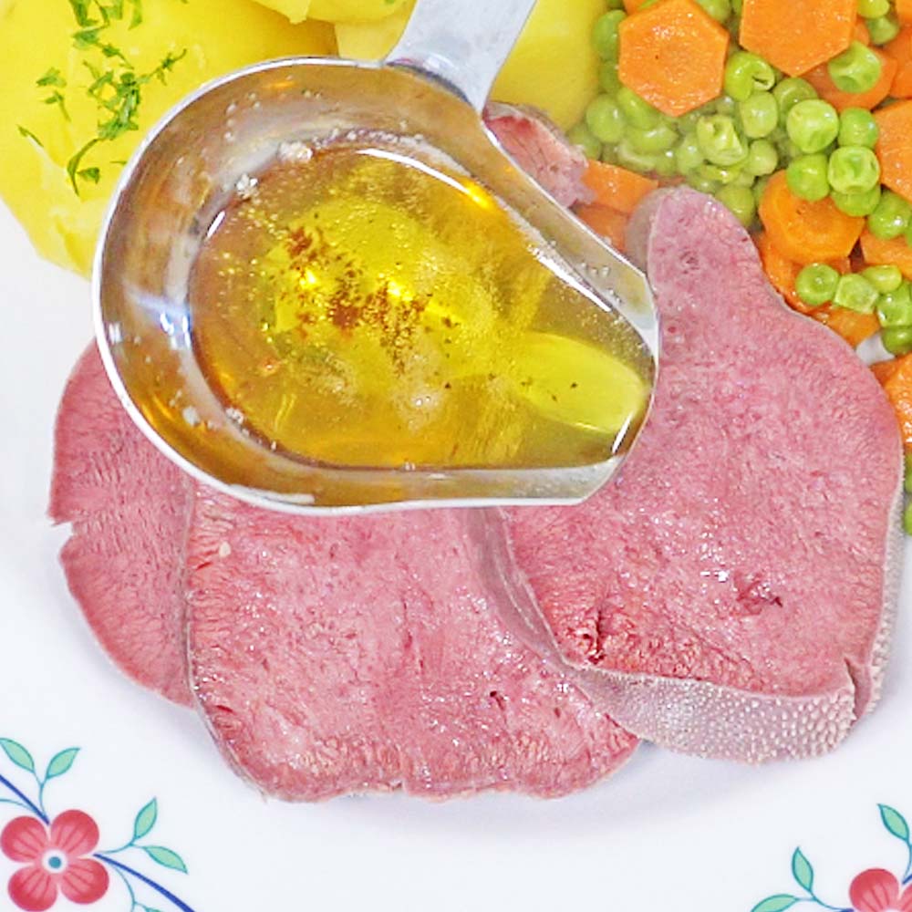 Gepökelte Rinderzunge mit zerlassener Butter