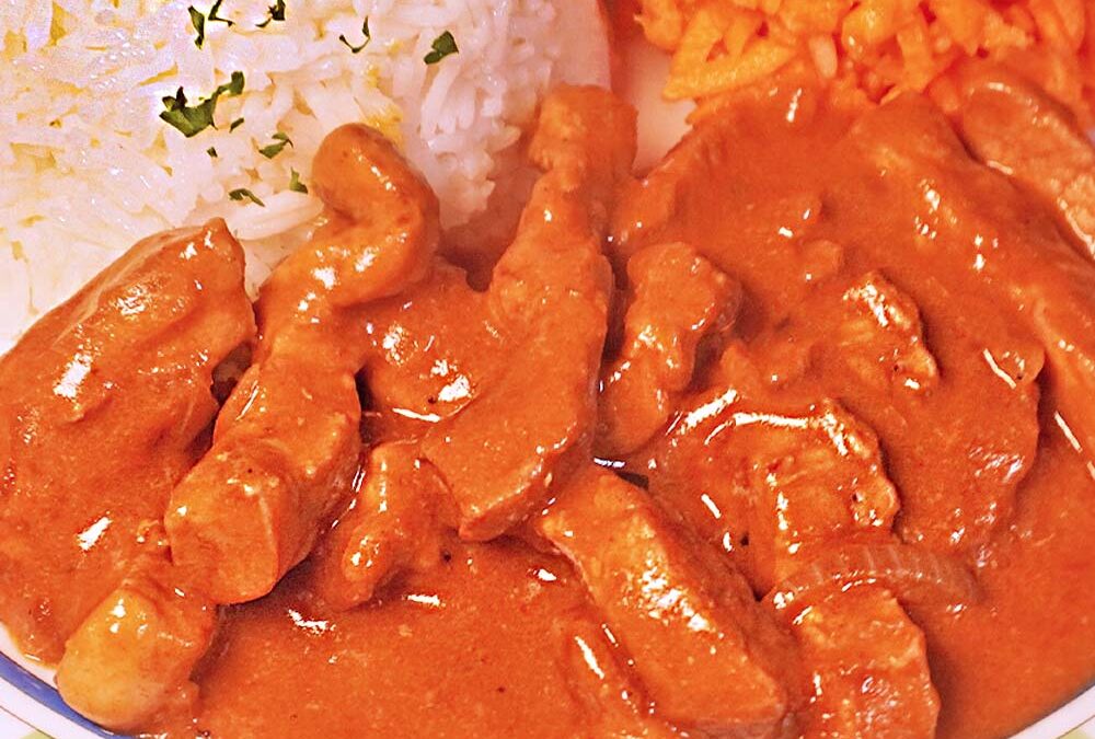 Rezept für Schweinegeschnetzeltes mit Senf-Soße und Reis